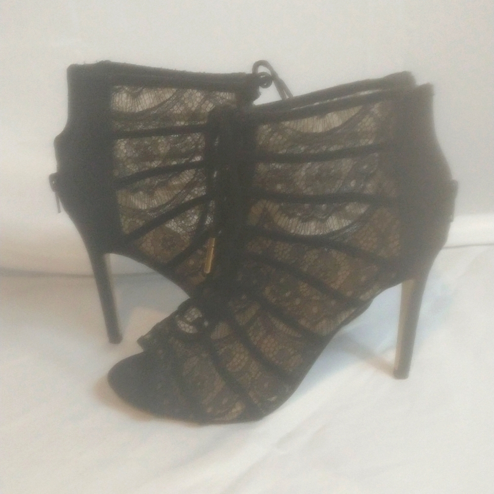 Women's size 10 black heels bootie zip back tie front